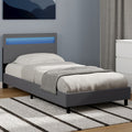Lit simple NEO avec tête de lit LED intégrée et sommier 90 x 190 cm PVC gris
