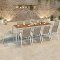 Salon de jardin NOUMEA table 240 cm plateau verre trempé effet bois et 10 chaises empilables blanc et bois