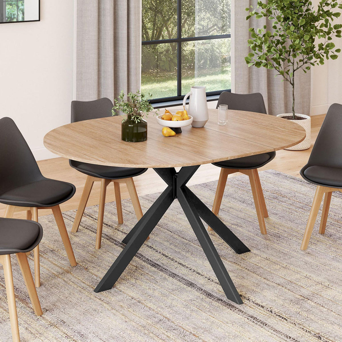 Table à manger ronde extensible ALIX 4-8 personnes, pied araignée, bois et noir, 110-150 cm